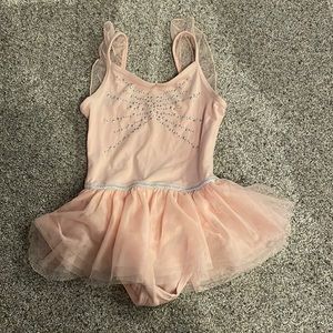 Pink leotard with attached skirt